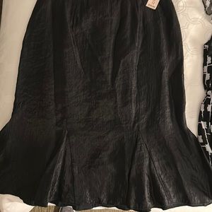 Size 12 black skirt from dress barn never worn tag still on it